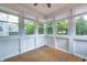 Inviting sun room features bright windows and ceramic tile floor at 9158 Oak Knoll Ln, Fishers, IN 46037