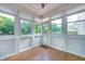 Cozy sun room featuring bright windows and ceramic tile floor at 9158 Oak Knoll Ln, Fishers, IN 46037