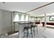 Basement featuring a bar, stools, and pool table at 974 Arrowwood Dr, Carmel, IN 46033
