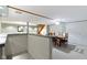 Finished basement with a dining area featuring a wooden table and carpeted floors at 974 Arrowwood Dr, Carmel, IN 46033