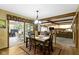 Open dining area with easy access to the kitchen, living room, and outdoor patio at 974 Arrowwood Dr, Carmel, IN 46033