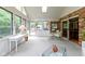 Inviting sunroom with ample natural light, neutral decor, and an open space for relaxation or entertainment at 974 Arrowwood Dr, Carmel, IN 46033