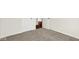 Bedroom featuring carpet flooring, base trim, two doors and a view into the hallway at 104 Maxim Ct, Cumberland, IN 46229