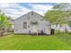 This home has a spacious backyard with well-kept grass, offering a private and serene outdoor space at 1124 S Lockburn St, Indianapolis, IN 46241