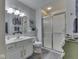 Bathroom featuring a single sink vanity and a walk-in shower at 1130 Deerbrook Trl, Greenwood, IN 46142