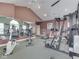 Functional workout area with stationary bikes, weight machines, and mirrored walls at 1130 Deerbrook Trl, Greenwood, IN 46142