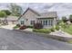Well-maintained home showcasing stone accents, mature landscaping, and a welcoming driveway at 1130 Deerbrook Trl, Greenwood, IN 46142