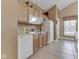 Fully equipped kitchen with ample cabinet space, modern appliances, and durable tile floors at 1130 Deerbrook Trl, Greenwood, IN 46142