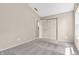 Neutral bedroom with double closets, plush carpeting, and access to a hallway at 1139 Fernwood Way, Plainfield, IN 46168