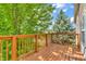 Spacious wood deck with railing, perfect for outdoor entertaining and enjoying the surrounding greenery at 1139 Fernwood Way, Plainfield, IN 46168