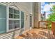 Exterior view of a deck, door, and window, showcasing the outdoor living space at 1139 Fernwood Way, Plainfield, IN 46168