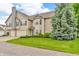 Inviting exterior of a townhouse with a well-maintained lawn and mature landscaping at 1139 Fernwood Way, Plainfield, IN 46168