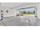 Spacious garage with ample room for parking and storage, door open with outside view at 1139 Fernwood Way, Plainfield, IN 46168