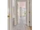 Hallway with multiple doorways, carpeted floor and neutral paint at 1139 Fernwood Way, Plainfield, IN 46168