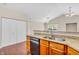 Kitchen with granite counters, modern appliances, wood cabinets and stainless steel sink at 1139 Fernwood Way, Plainfield, IN 46168