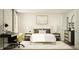 Charming bedroom design with a desk, neutral tones, patterned rug, and modern furnishings at 11626 Aubrey Ln, Fishers, IN 46040