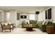 Inviting living room features a comfortable green sectional sofa, stylish decor, and plenty of natural light at 11626 Aubrey Ln, Fishers, IN 46040