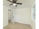 Bedroom with ceiling fan, carpet, closet and neutral paint at 125 S Alfonte St, Ingalls, IN 46048