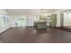 Open living space combines a modern kitchen with an airy living area, perfect for entertaining at 125 S Alfonte St, Ingalls, IN 46048