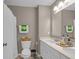 Bathroom features a double sink vanity, ample lighting, and a shower for a perfect morning routine at 1381 Avocet Dr, Greenwood, IN 46143