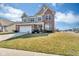 Charming home with a well-manicured lawn and attached two-car garage at 1381 Avocet Dr, Greenwood, IN 46143
