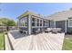 This house features a wooden deck with seating for entertaining and outdoor enjoyment at 1480 E Jefferson St, Franklin, IN 46131