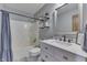 This recently updated bathroom features a shower-tub combo and a stylish vanity at 1480 E Jefferson St, Franklin, IN 46131