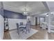 Charming dining room with wainscoting, a round table, and stylish lighting fixture at 1480 E Jefferson St, Franklin, IN 46131