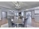 Cozy dining room with open layout, connecting to living areas and modern kitchen at 1480 E Jefferson St, Franklin, IN 46131