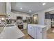Bright kitchen features stainless steel appliances, stylish finishes, and center island at 1480 E Jefferson St, Franklin, IN 46131