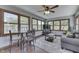 Comfortable living area with expansive windows, plush seating, and a warm, inviting vibe at 1480 E Jefferson St, Franklin, IN 46131