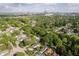 Residential area with mature trees and a variety of home styles, surrounded by greenery at 1502 Burdsal Pkwy, Indianapolis, IN 46208