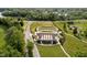 Aerial view showcasing a park amphitheater, pathways, lush landscaping, and recreational areas at 1502 Burdsal Pkwy, Indianapolis, IN 46208