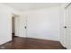 Bedroom features hardwood floors and white walls at 1502 Burdsal Pkwy, Indianapolis, IN 46208