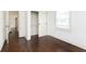 Bedroom featuring a window and a closet with sliding doors at 1502 Burdsal Pkwy, Indianapolis, IN 46208