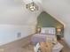 Bedroom featuring vaulted ceilings, and neutral decor at 1502 Burdsal Pkwy, Indianapolis, IN 46208