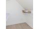 Well-organized walk-in closet with white wire shelving and ample storage space, perfect for staying organized at 1502 Burdsal Pkwy, Indianapolis, IN 46208