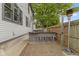 Backyard with a built in outdoor bar and brick patio area at 1526 Carrollton Ave, Indianapolis, IN 46202