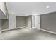 Spacious unfinished basement with a walk in shower, recessed lighting, and painted gray walls at 1526 Carrollton Ave, Indianapolis, IN 46202