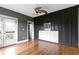 Bedroom featuring a custom closet and a balcony with french doors at 1526 Carrollton Ave, Indianapolis, IN 46202