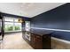 Kitchen island with a stainless steel oven and dark wood cabinets in a bright, spacious kitchen at 1526 Carrollton Ave, Indianapolis, IN 46202