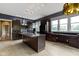 Bright and airy kitchen with large island, custom cabinetry, and modern appliances at 1526 Carrollton Ave, Indianapolis, IN 46202