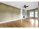 Spacious living room showcasing hardwood floors, a fireplace with built-ins, and abundant natural light at 1526 Carrollton Ave, Indianapolis, IN 46202