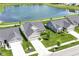 Scenic aerial view of a home with a pond in a neighborhood at 1530 Gristmill Meadows Dr, Westfield, IN 46074