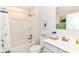 A well-lit bathroom with a tub/shower combination and updated vanity and framed mirror at 1530 Gristmill Meadows Dr, Westfield, IN 46074