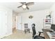 Bedroom featuring a ceiling fan, neutral paint, built in shelving, decor on the walls, and a chair at 1530 Gristmill Meadows Dr, Westfield, IN 46074