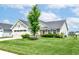 Inviting home showcasing a well-kept lawn and beautiful curb appeal at 1530 Gristmill Meadows Dr, Westfield, IN 46074
