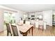 Bright eat-in kitchen with stainless appliances, white cabinets, and breakfast bar with seating at 1530 Gristmill Meadows Dr, Westfield, IN 46074