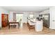 Bright kitchen featuring stainless steel appliances, a center island, and a dining area with a sliding glass door at 1530 Gristmill Meadows Dr, Westfield, IN 46074