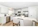 Modern kitchen with stainless steel appliances, white cabinetry, and plenty of counter space at 1530 Gristmill Meadows Dr, Westfield, IN 46074